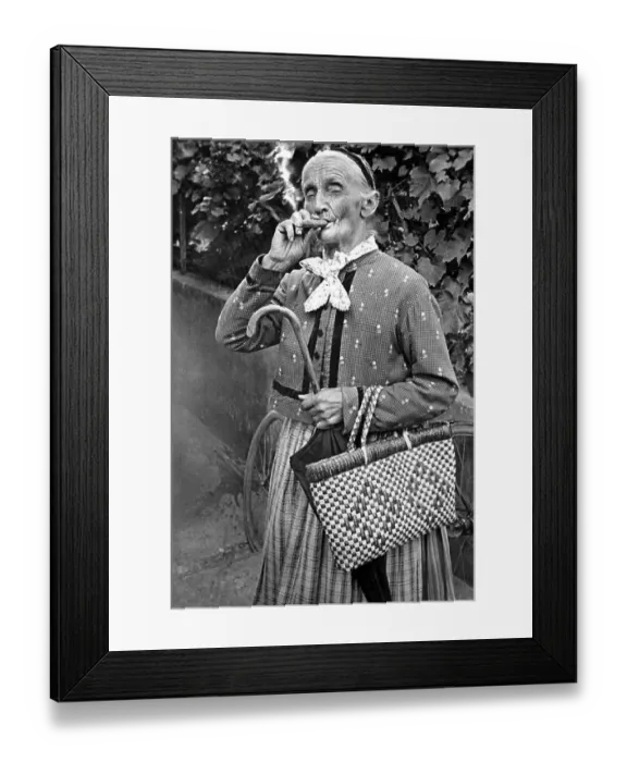 Framed Print : Grandma smokes cigar, 1920s, Germany, Europe Framed Print : Grandma smokes cigar, 1920s, Germany, Europe