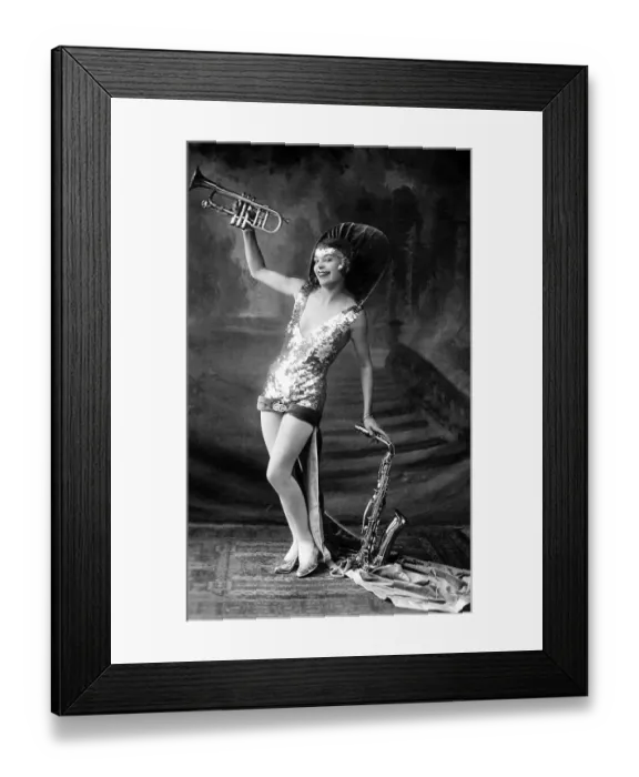 Framed Print : Woman with saxophone and trumpet
