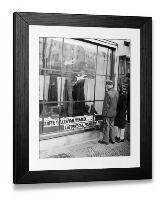 Framed Print : Postwar history, showcase for fabrics that came over the Berlin Airlift during the blockade in the city Framed Print : Postwar history, showcase for fabrics that came over the Berlin Airlift during the blockade in the city