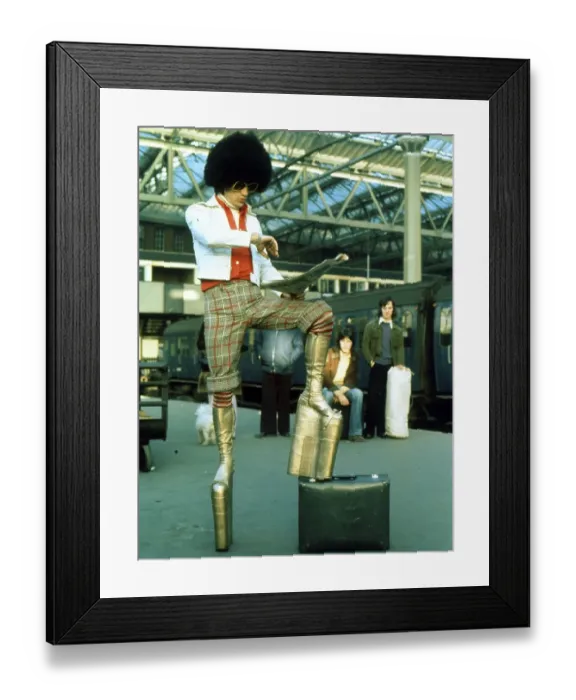 Framed Print : Man in 70s outfit, platform shoes