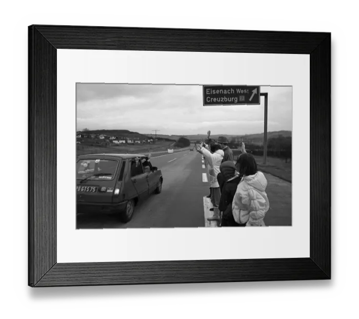 Framed Print : Fall of the Berlin Wall, East Germans waving at West Germans