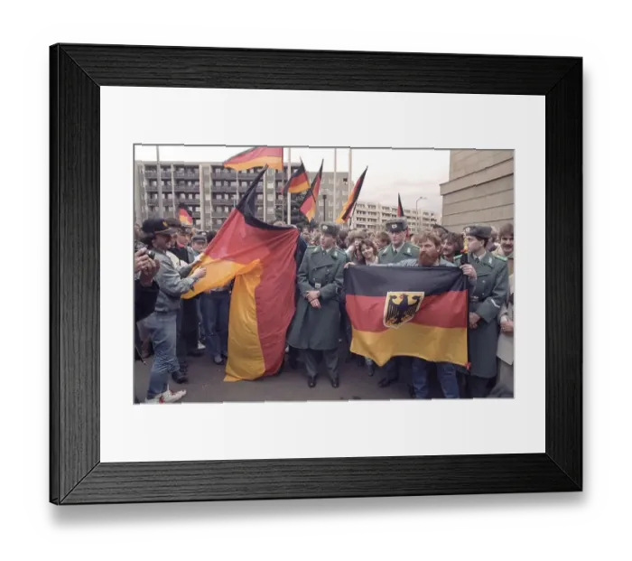 Framed Print : East Germans are waiting for the arrival of Chancellor Helmut Kohl