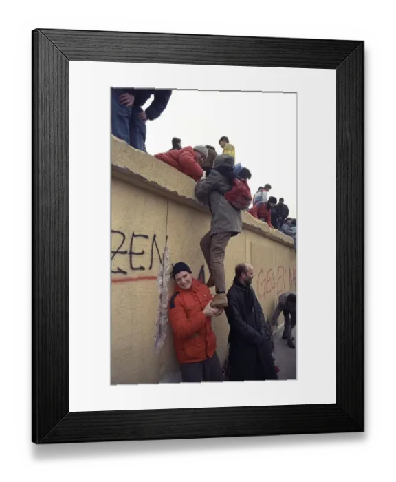 Framed Print : People climbing the Berlin Wall at Brandenburg Gate Framed Print : People climbing the Berlin Wall at Brandenburg Gate