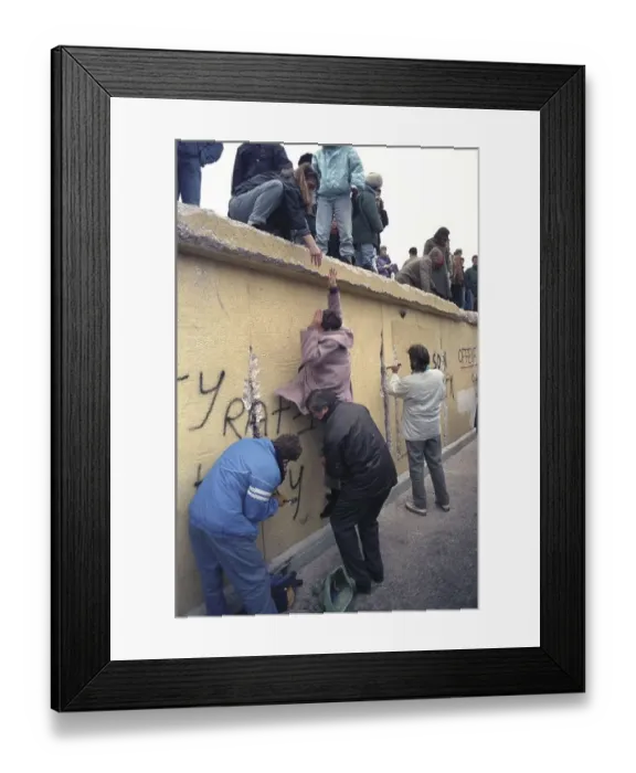 Framed Print : People climbing the Berlin Wall at Brandenburg Gate Framed Print : People climbing the Berlin Wall at Brandenburg Gate