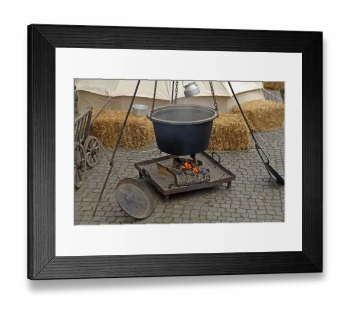 Framed Print : Old kettle over a fireplace at a historical festival in Gengenbach