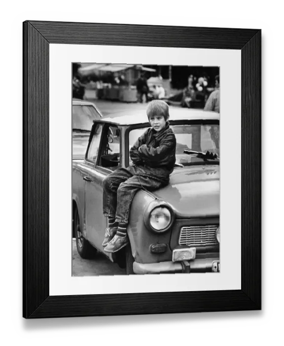 Framed Print : A boy sits on Trabant 601, East Europe, circa 1988
