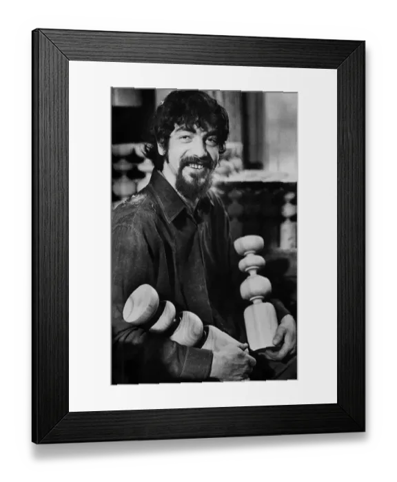 Framed Print : Sculptor holding lathed candle holders