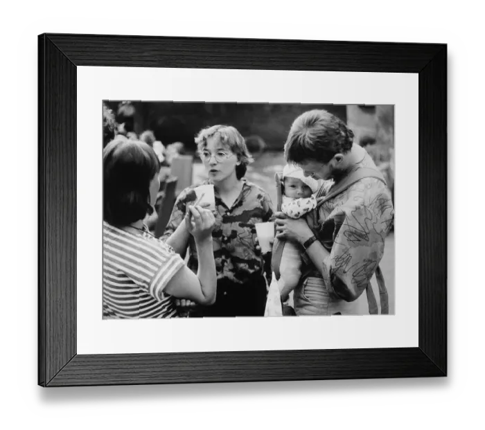 Framed Print : Young people with a baby, East Germany