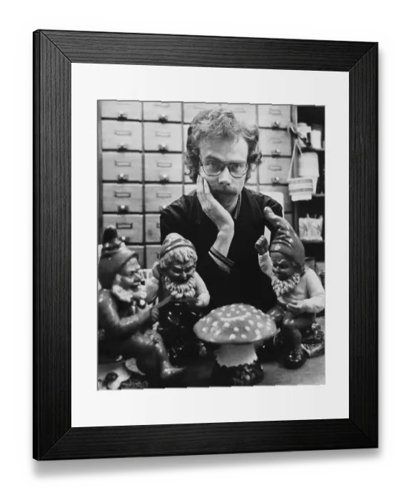 Framed Print : Shop owner with garden gnomes, circa 1975