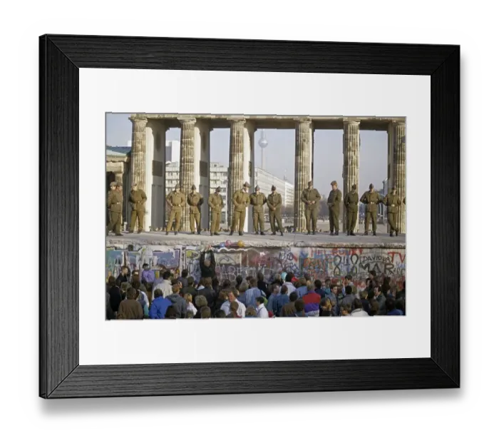 Framed Print : Fall of the Berlin Wall: border guards of the National Army securing the Wall at the Brandenburg Gate Framed Print : Fall of the Berlin Wall: border guards of the National Army securing the Wall at the Brandenburg Gate
