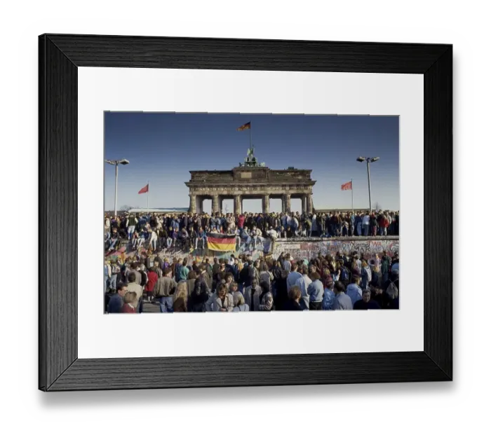Framed Print : Fall of the Berlin Wall, people from East and West Berlin climbing on the Wall at the Brandenburg Gate Framed Print : Fall of the Berlin Wall, people from East and West Berlin climbing on the Wall at the Brandenburg Gate