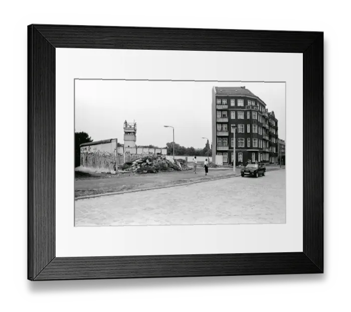 Framed Print : Remains of the Berlin Wall with a watchtower at Lohmuehlenstrasse road Framed Print : Remains of the Berlin Wall with a watchtower at Lohmuehlenstrasse road