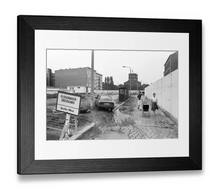 Framed Print : View of the former death strip of the Berlin Wall on Engeldamm road from the Kopenickerstrasse towards the Kreuzberg Framed Print : View of the former death strip of the Berlin Wall on Engeldamm road from the Kopenickerstrasse towards the Kreuzberg