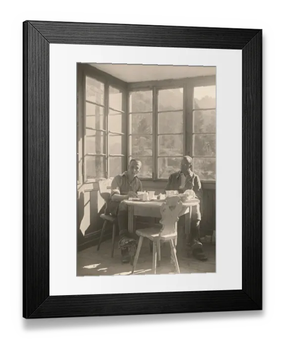 Framed Print : Historic photograph of a mountain climber taking a break at an alpine restaurant
