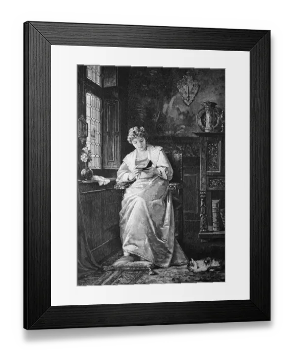 Framed Print : Woman reading a book at the window Framed Print : Woman reading a book at the window