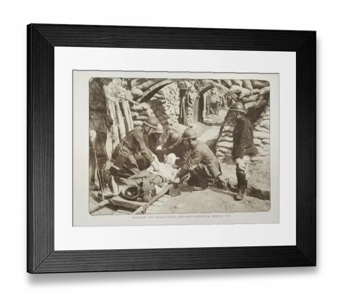 Framed Print : Wounded soldier on stretcher at first aid postin trench in Flanders during the First World War