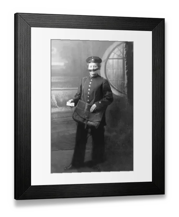 Framed Print : Woman masquerading as a postman with letter