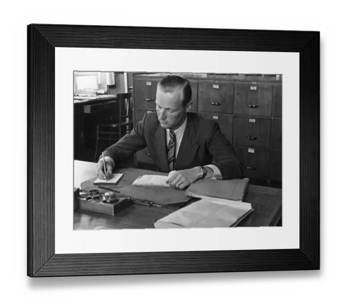Framed Print : Man writing in his office, historic picture from about 1940 Framed Print : Man writing in his office, historic picture from about 1940