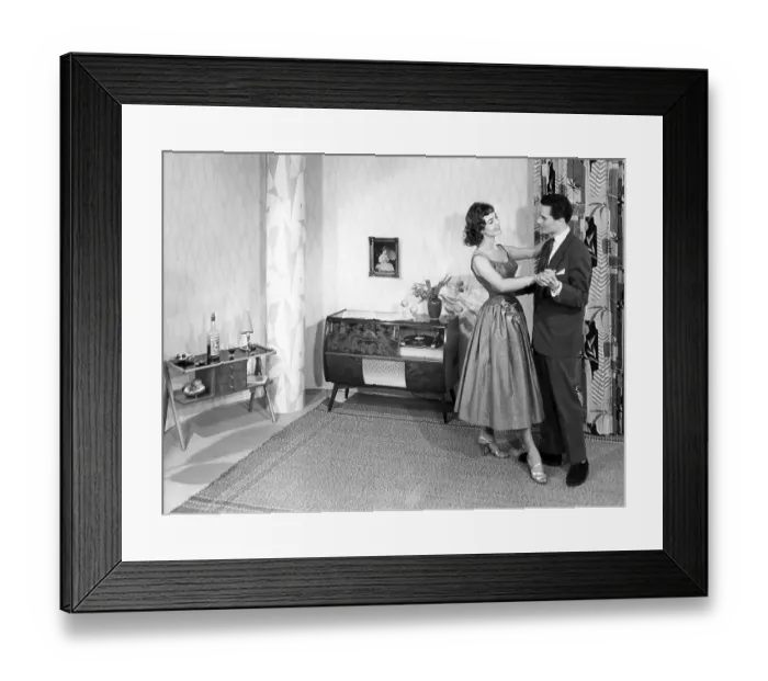 Framed Print : Couple dancing in the living room