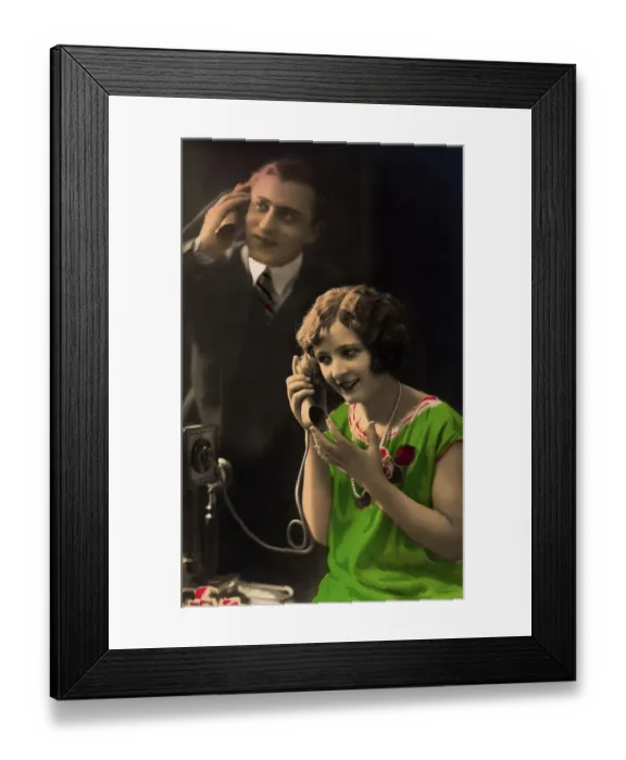 Framed Print : Historic photograph, couple on the phone Framed Print : Historic photograph, couple on the phone