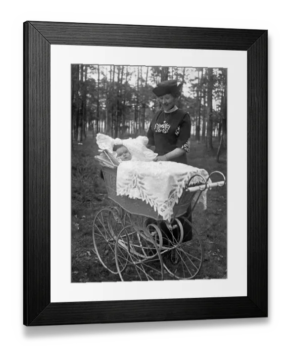 Framed Print : Historic photograph, woman with baby in a pram