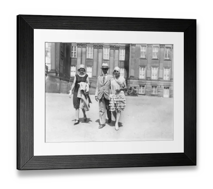 Framed Print : Historic photograph, man and two women out for a stroll