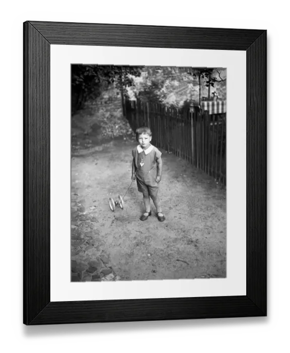 Framed Print : Historic photograph, child with toy, thirties Framed Print : Historic photograph, child with toy, thirties