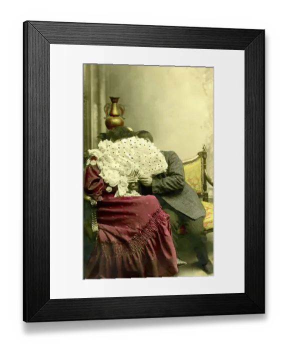 Framed Print : Historic photo, couple kissing behind the fan