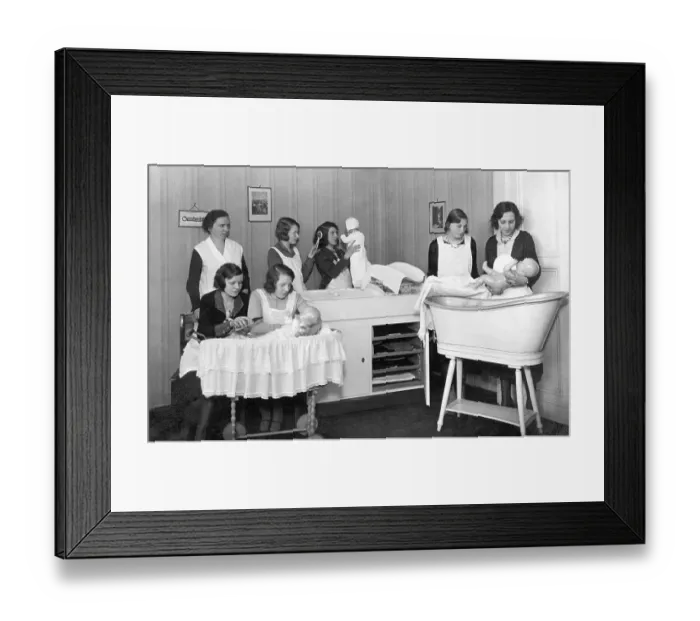 Framed Print : Historic photo, women learning how to deal with newborn babies