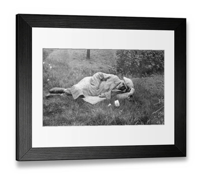 Framed Print : Historic photo, man sleeping in the grass