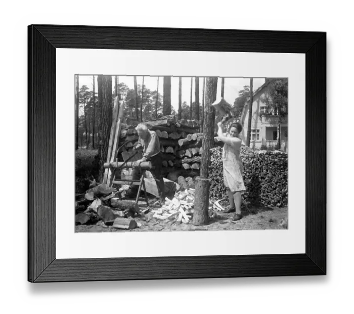 Framed Print : Historic photo, man and woman chopping wood