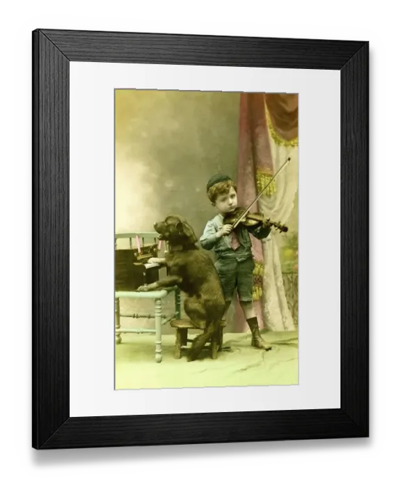 Framed Print : Historic picture, boy with dog playing music Framed Print : Historic picture, boy with dog playing music