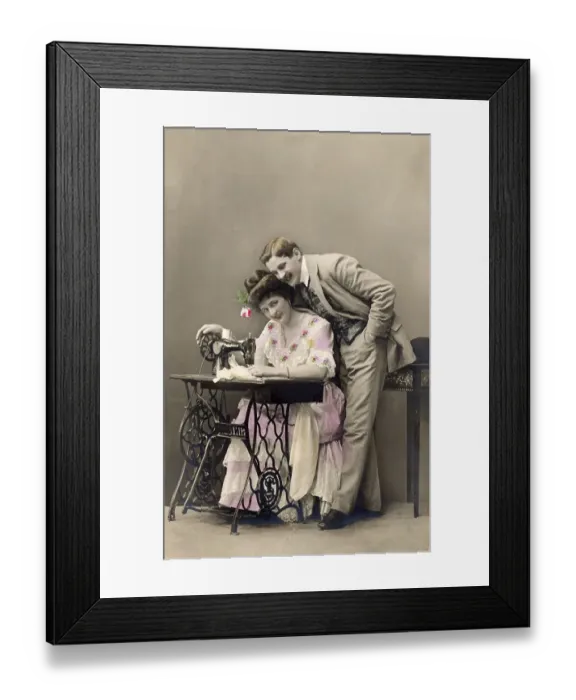 Framed Print : Historic photograph, couple with a sewing machine Framed Print : Historic photograph, couple with a sewing machine