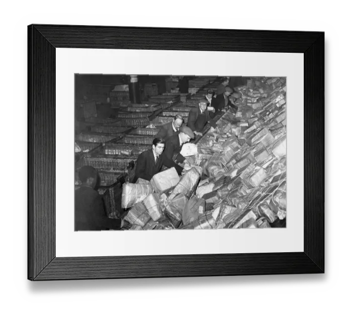 Framed Print : Historic photograph, postal workers sorting packages