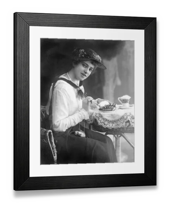 Framed Print : Historic photograph, woman eating cake