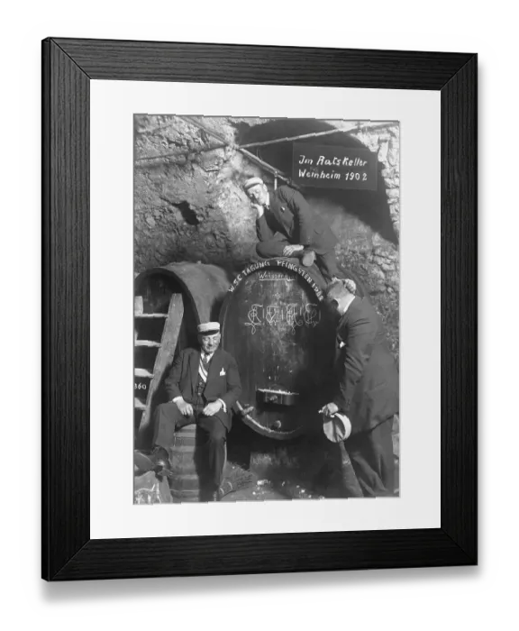 Framed Print : Historic photograph, men in a wine cellar in Weinheim