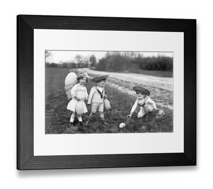 Framed Print : Historic photograph, children looking for Easter eggs