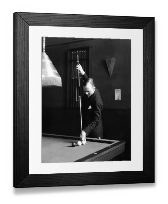 Framed Print : Historic photograph, man playing billiards