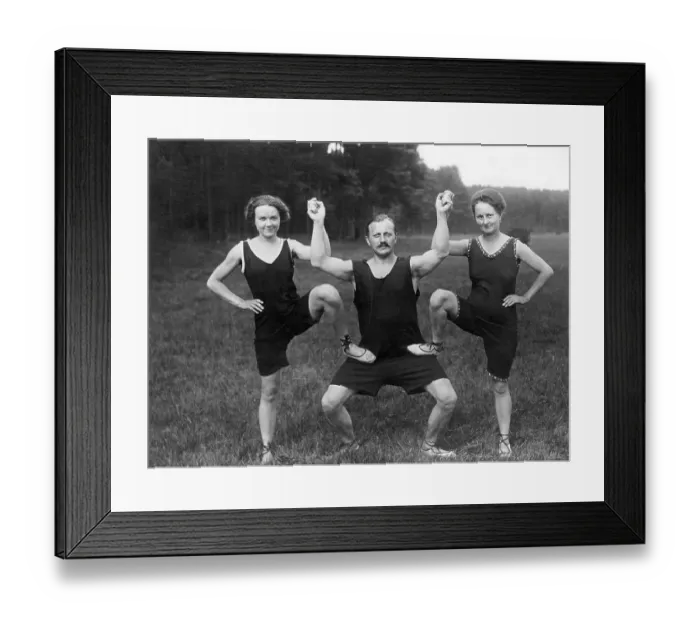 Framed Print : Historical image, man with two women wearing sporting outfits