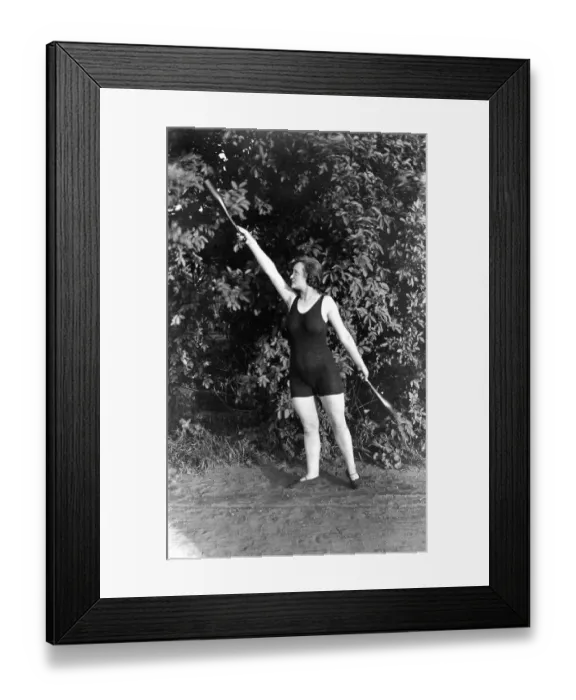 Framed Print : Historic photograph, woman with clubs, around 1921