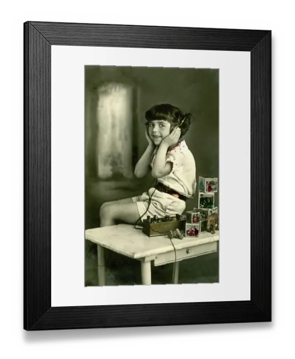 Framed Print : Historic photograph, child listening to the radio Framed Print : Historic photograph, child listening to the radio