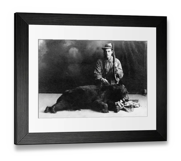 Framed Print : Hunter with a bear, historic photograph Framed Print : Hunter with a bear, historic photograph