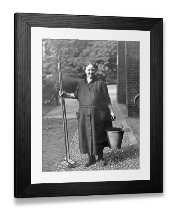 Framed Print : Old woman with bucket and broom Framed Print : Old woman with bucket and broom