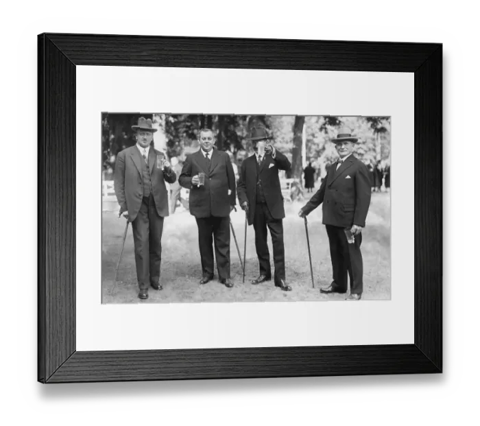 Framed Print : Four men with glasses of beer and walking sticks