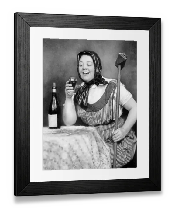 Framed Print : Cleaning lady drinking wine, historic photograph Framed Print : Cleaning lady drinking wine, historic photograph