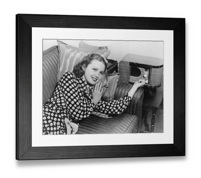 Framed Print : Woman listening to the radio, historic photograph Framed Print : Woman listening to the radio, historic photograph