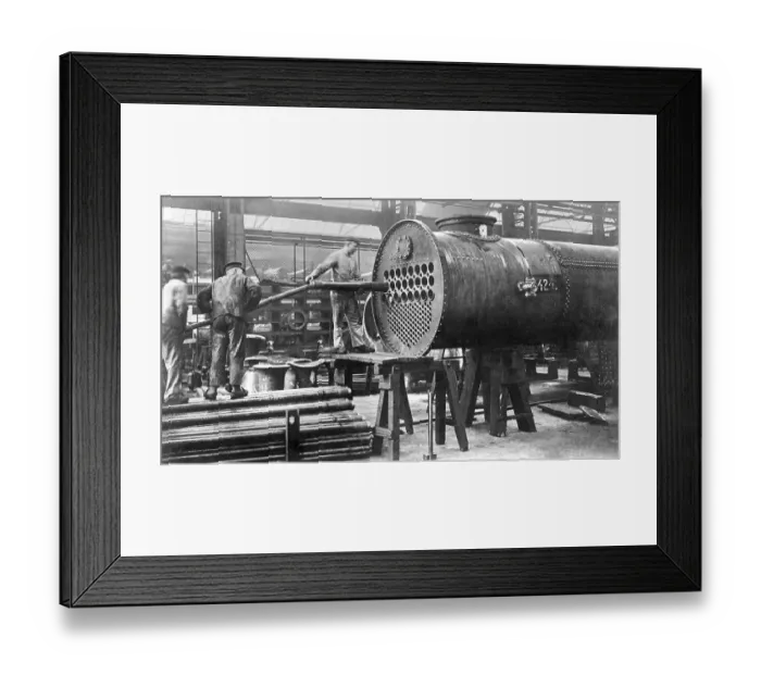 Framed Print : Construction of a locomotive, installing the pipes Framed Print : Construction of a locomotive, installing the pipes