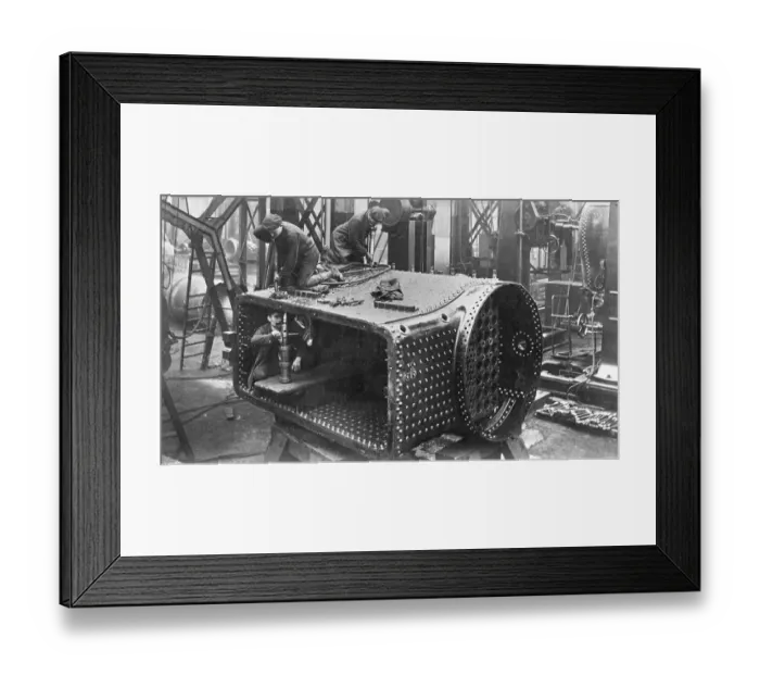 Framed Print : Steam locomotive construction, stud bolts being riveted Framed Print : Steam locomotive construction, stud bolts being riveted