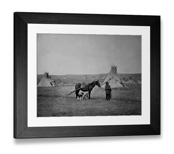 Framed Print : An Indian woman with her Indian pony in front of the tipis of an Indian village in the Alberta region