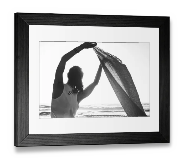 Framed Print : Rearview shot of a young woman with a t-shirt printed with an OM sign at the beach Framed Print : Rearview shot of a young woman with a t-shirt printed with an OM sign at the beach